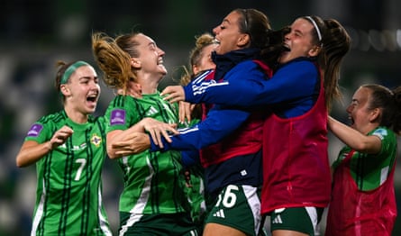 Lauren Wade, second left, celebrates with her teammates after scoring the extra-time winner