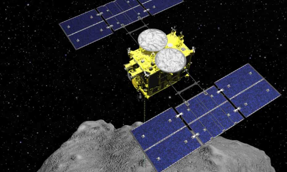 A computer graphic image of the Hayabusa2 spacecraft on the asteroid Ryugu