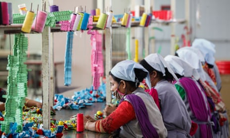 Bangladeshi workers at a garment factory on the outskirts of Dhaka
