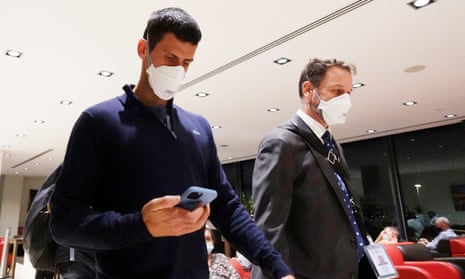 Novak Djokovic seen in Melbourne Airport before boarding a flight, after the Federal Court upheld a government decision to cancel his visa to play in the Australian Open, in Melbourne, Australia.