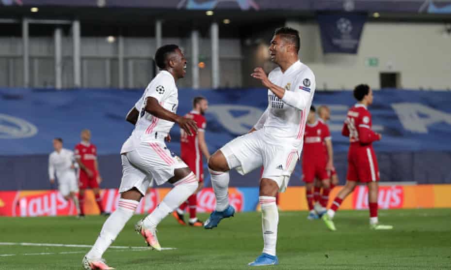 Vinícius Júnior celebrates with Casemiro after scoring his second goal of the game.