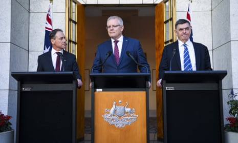 Health minister Greg Hunt, prime minister Scott Morrison and chief medical officer Prof Brendan Murphy hold a press conference at Parliament House.