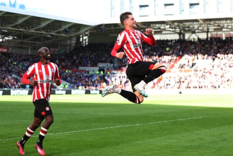 Brentford’s Mathias Jensen celebrates scoring their first goal.