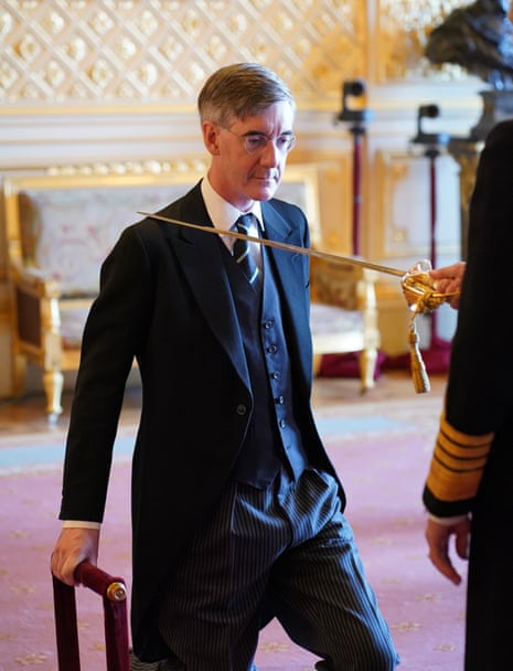 Jacob Rees-Mogg being knighted by the Princess Royal at Windsor Castle.