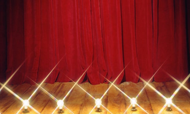 Red stage curtain and footlights