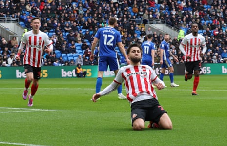 Adil Aouchiche of Sunderland celebrates scoring the opening goal during their Championship match at Cardiff City.