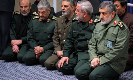 Gen Amir Ali Hajizadeh, right, attends a mourning ceremony for Gen Qassem Suleimani