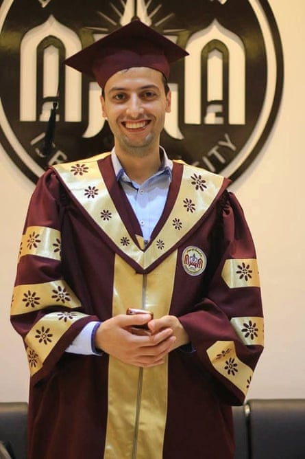 Ahmed Alsalibi wearing a gown and mortar board