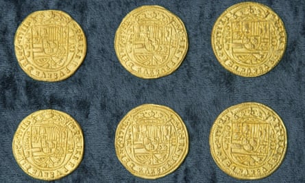 Six royal gold coins recovered from a Spanish shipwreck near Florida.