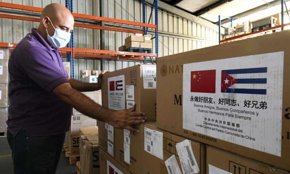 A worker transports medical supplies donated to Cuba from China. 