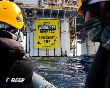 Greenpeace activists protesting against Woodside’s proposed Browse project on Scott Reef deploy a massive banner at the company’s Scarborough gas platform off the coast of Western Australia on 17 October.
