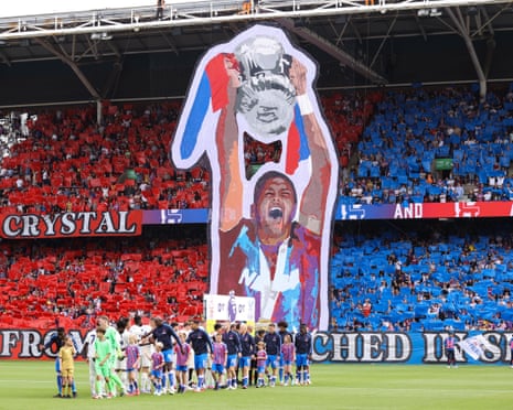 A tifo showing Joel Ward lifting the FA Cup in August 2025.