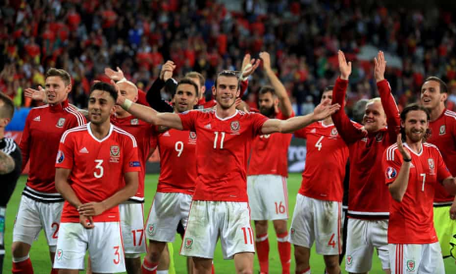 Gareth Bale leads the celebrations after the quarter-final win over Belgium.