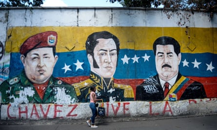 A mural of Chávez, Bolívar and Maduro in Caracas.