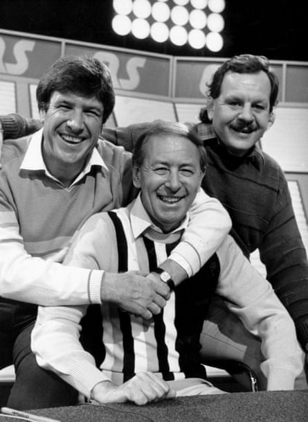 A Question of Sport presenter David Coleman (centre) with captains Emlyn Hughes and Bill Beaumont in 1985.