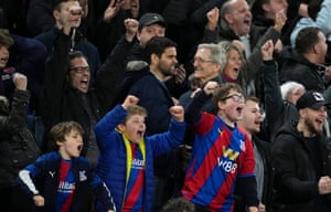 Young Crystal Palace fans celebrate after Wilfried Zaha scored from the penalty spot.