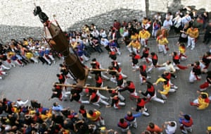The Ceraioli run through the streets of Gubbio, Italy.