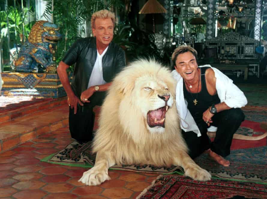 Siegfried and Roy and friend.