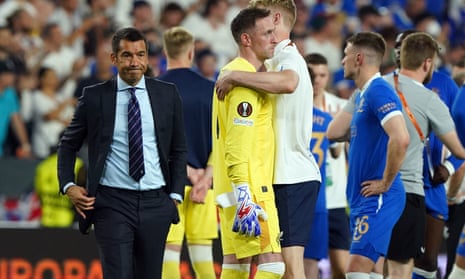 Giovanni van Bronckhorst goes to console Allan McGregor after Rangers’ penalty shootout defeat in the Europa League final
