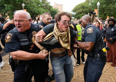 University of Texas police officers arrest a man at a pro-Palestinian protest on campus in Austin.