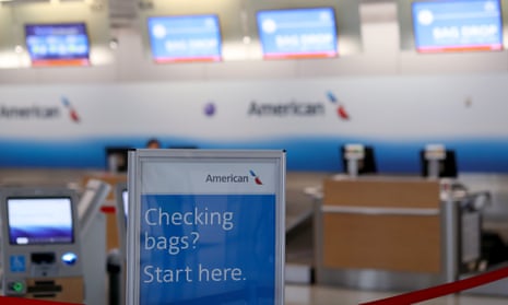 The American check-in desk at Dallas-Forth Worth airport. The five airlines are pushing for a $50bn-plus bailout package to help them deal with the economic effects of the coronavirus.