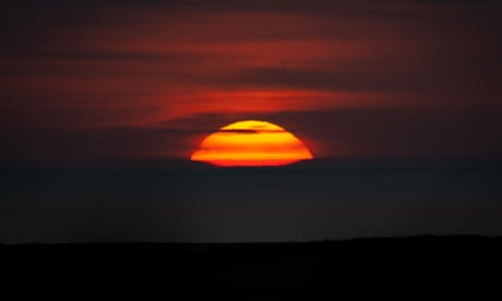The sunset viewed from St Endellion, Cornwall, England. (Photo by Finnbarr Webster/Getty Images)