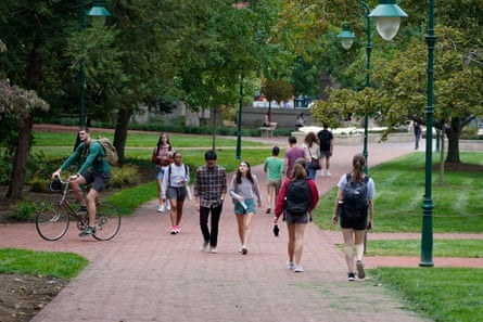 students walk on campus