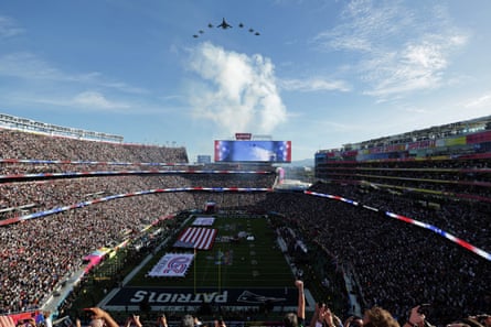 The view inside the stadium as the national anthem is performed at Super Bowl LX