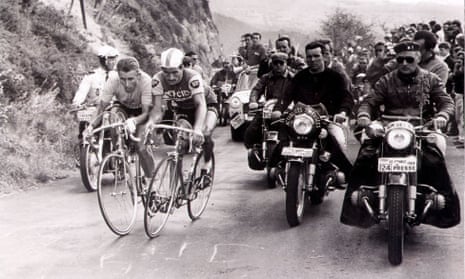 Jacques Anquetil (left) and Raymond Poulidor duel for the lead during the epic climb up Puy de Dome on 12 July 1964.