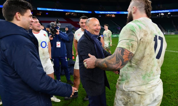 Eddie Jones shakes hands with Joe Marler after England beat France to win the Autumn Nations Cup.