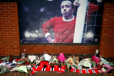 Tributes for the former Manchester United and England player Nobby Stiles outside Old Trafford in 2020