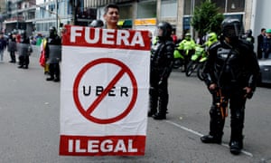 Taxi drivers protest against Uber in Bogota. Photograph: EPA/Leonardo Munoz