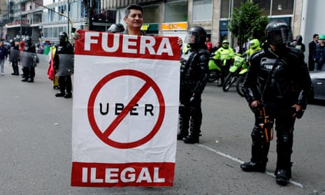 Taxi drivers protest against Uber in Bogota. Photograph: EPA/Leonardo Munoz