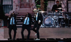 Matthew Healy (centre) on stage during the 1975’s performance.