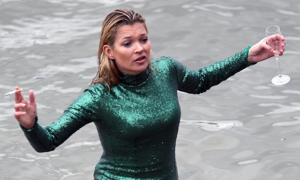 kate moss sequin dress Kate Moss is pictured wearing the iconic vibrant yellow sequin gown designed by Chanel for their 1999 couture runway show
