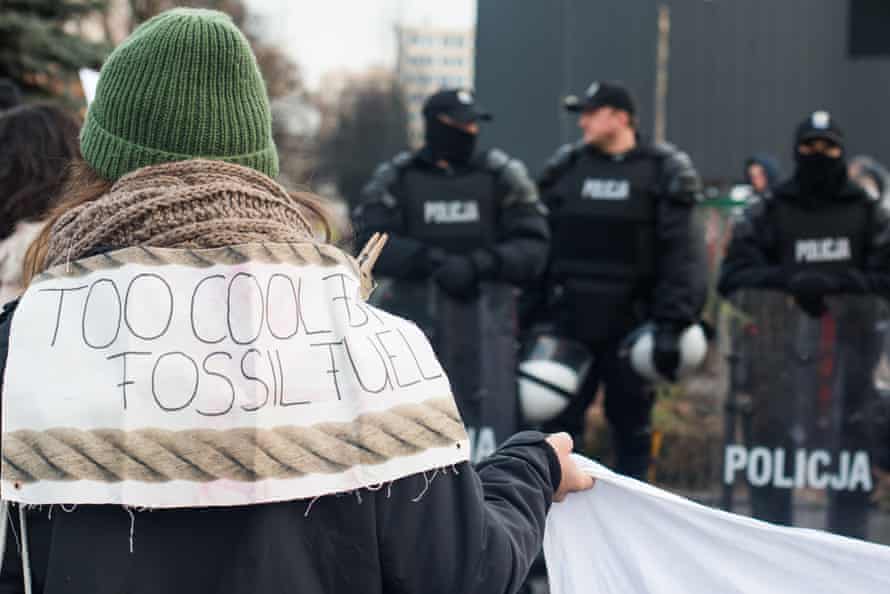 A protester outside the climate conference in Katowice.