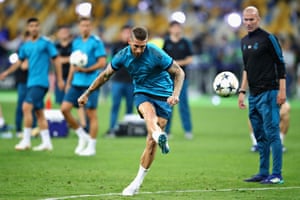 Ramos under the watchful eye of Zinedine Zidane.