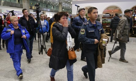 People arrive at Pulkovo airport for news of the plane crash.
