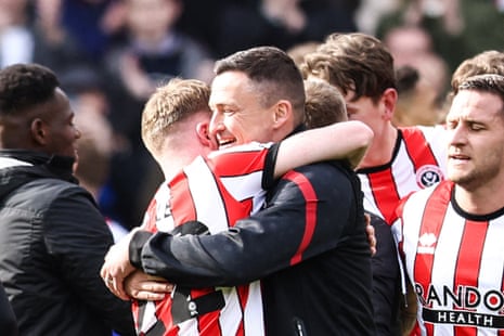 Doyle is congratulated by Sheffield United's manager Paul Heckingbottom.