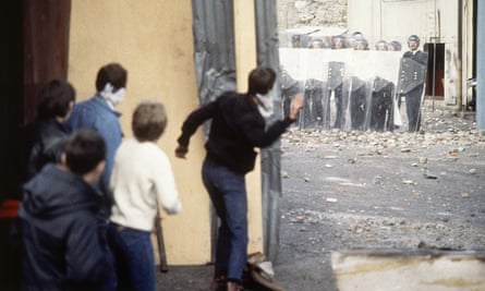 Boys throwing rocks at riot police in Derry, 1981.