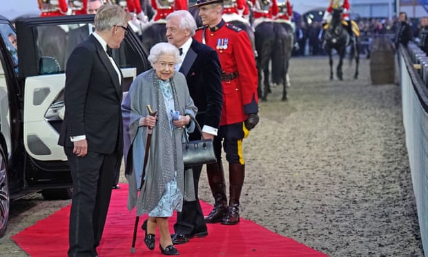 The Queen was driven into the arena under escort from the mounted divisions of the Household Cavalry. 