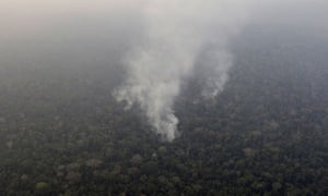 Smoke billows from a fire in an area of the Amazon near Porto Velho.