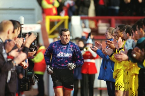 Peter Shilton is applauded onto the pitch by both the Leyton Orient and Brighton players.
