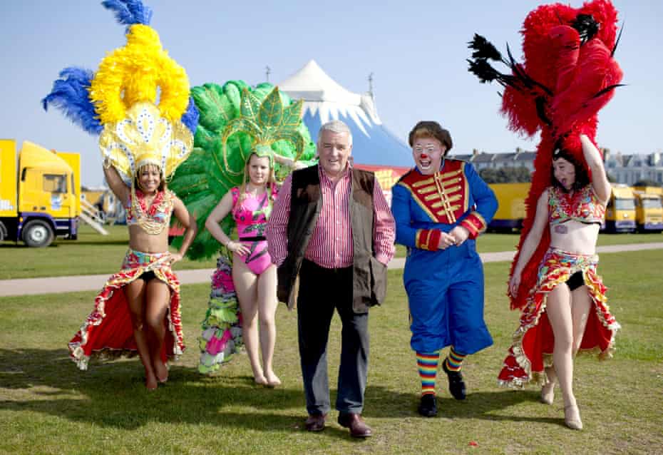 Gerry Cottle with members of his circus troupe in Southsea, Hampshire, 2012.