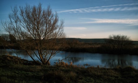 Amberley Wildbrooks, with the South Downs in the distance, seen across the River Arun from the Sussex Wildlife Trust's Waltham Brooks reserve
