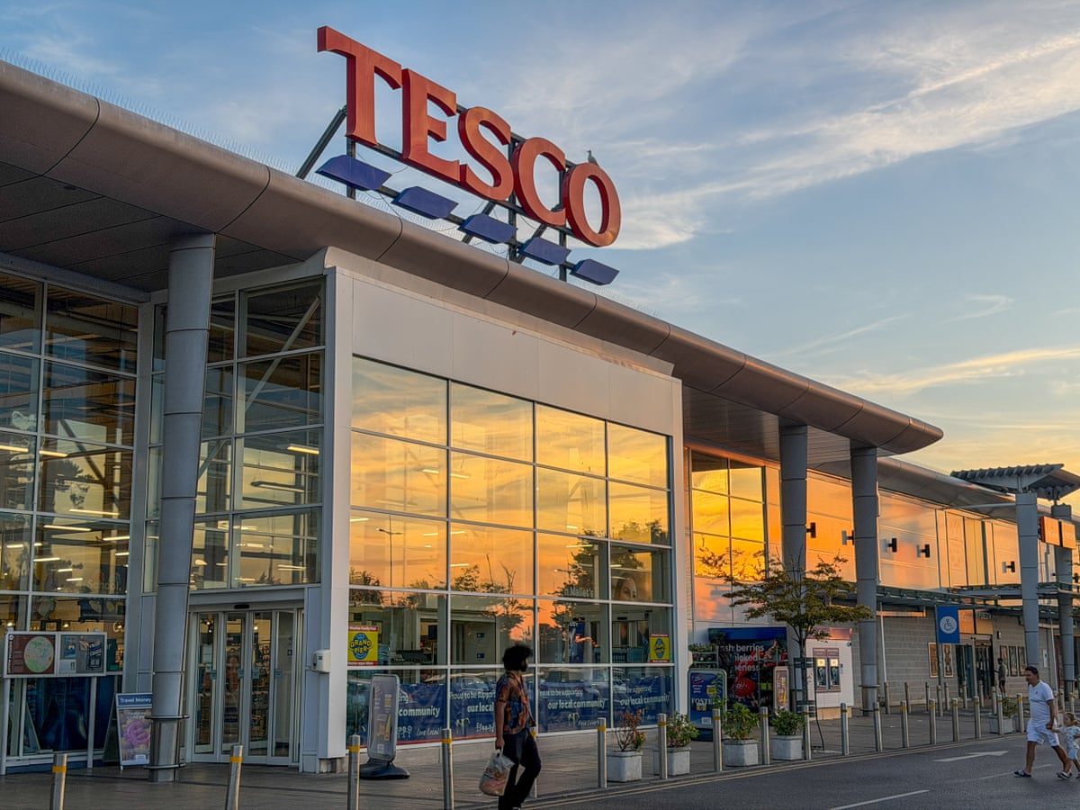 A Tesco in Somerset with the setting sun reflected in its windows