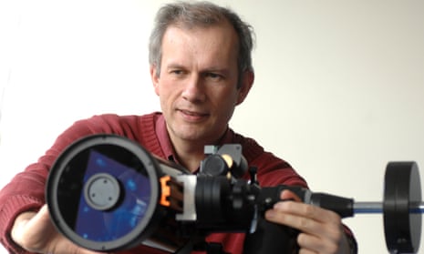 Prof Tom Marsh with a telescope