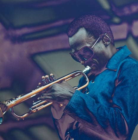 Miles Davis performs at the Newport Jazz Festival in July 1969, the month before he went into the studio to record Bitches Brew.