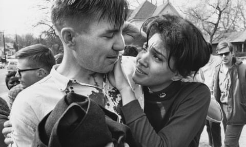 Surrounded by fellow demonstrators, student organizer Harriet Richardson comforts the poet Galway Kinnell, who had been hit with a state trooper’s billy club in Montgomery, Alabama on March 16, 1965. 