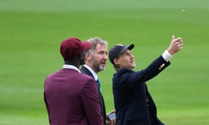 England captain Joe Root performs the toss alongside West Indies captain Jason Holder and match referee Chris Broad.